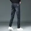 Jeans Azules Rectos Holgados de Otoño para Hombre 2026 Nueva Marca Americana de Moda Versátiles Elásticos Pantalones Casuales