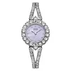O relógio feminino redondo de quartzo mais vendido da Gedi com pulseira cravejada de diamantes, à prova d'água, estiloso e versátil, relógio de pulso feminino de nicho para o dia a dia.