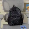 Mochila escolar de nuevo estilo para niñas, moderna y elegante, mochila de estrella pequeña, mochila de estilo coreano de gran capacidad para estudiantes de primaria y secundaria