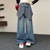 Pantalones de Mezclilla con Peto a Cuadros de Moda Casual para Niñas Primavera y Otoño 2026 Nuevos Tallas Medianas y Grandes para Niños Pantalones de Pierna Ancha Sueltos Versátiles Tendencia