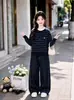 Conjunto de punto de otoño para niñas 2026 estilo nuevo, cárdigan a rayas casual y jeans de pierna ancha conjunto de dos piezas para niños mayores