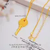 Collar con Colgante de Llave Flor de Lirio Chapado en Oro de Lujo para Mujer con Diseño de Ginkgo y Dios Amarillo de la Riqueza, Mismo Estilo que la Tienda de Oro Puzuo