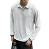Camisa de manga larga, de color liso, hombros rectos, estilo americano para hombre, con un diseño de patchwork deconstruido, un look fresco y elegante, versátil, y que irradia una estética de alta gama