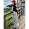 Traje Casual de Moda para Mujer, Nuevo Estilo Verano 2026, Top Negro de Manga Corta, Pantalones de Pierna Ancha de Cintura Alta, Conjunto de Dos Piezas Adelgazante Estilo Coreano
