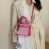 Bolso Retro de Gama Alta para Mujer 2026 Nueva Moda Urbano Sencillo Empalmado Versátil Bolso Cubo de Hombro Cruzado