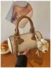 Bolso pequeño súper moderno y exquisito para mujer, nueva colección 2026, con un toque de alta gama, perfecto para el verano y el uso diario, un elegante bolso de hombro o bandolera.