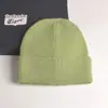 2022 nuevo gorro de punto con volantes de color liso para mujer, gorro de invierno de otoño e invierno, gorro de lana cálido de comercio exterior, combina con todo