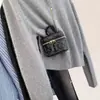 Cardigan de Punto de Lana Fina de Primavera Moda Simple Cuello Redondo Bajo con Perlas Doradas Nueva Chaqueta de Terciopelo Estilo Coreano para Mujer