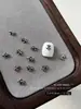 1000 piezas Plata Antigua Cruz Arte de Uñas Aleación Adornos Estilo Oscuro Punk Flor Decoración de Uñas Bolsa Completa Personalizado Venta al por Mayor