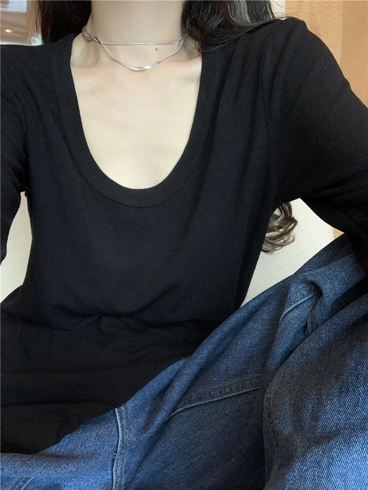 帮手描述图：不规则白色修身长袖T恤女2021春秋新款设计感紧