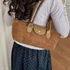 2026 Bolsa Fofa para o Dia a Dia Bolsa de Mão Retrô Feminina Outono Grande Capacidade Versátil Nicho Moda Ombro Único Novo Camurça Axila