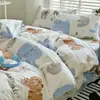 Juego de ropa de cama minimalista de cuatro piezas estilo Nantong, apto para todas las estaciones, hecho de algodón con estampado reactivo