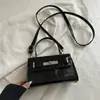 Bolso Pequeño Cuadrado de Moda con Hebilla de Cierre de Patrón de Cocodrilo 2026 Nuevo Bolso Cruzado Casual de Moda de Nicho Bolso para Mujer de Alto Valor
