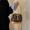 Bolso Cubo Retro de Textura de Alta Calidad para Mujer 2026 Nuevo Estilo Coreano Versátil Temperamento Bolso Cruzado de Hombro Casual para Mujer