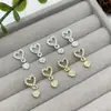 Accesorios para Uñas con Colgante de Corazón de Aleación Popular Transfronterizos, Corazones Metálicos Huecos Súper Brillantes para Uñas, Decoraciones para Uñas de Celebridad de Internet al por Mayor