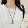Colar pingente anel gota d'água oco longo para mulheres, corrente de suéter de luxo leve de nicho de alta qualidade com acessório de cordão preto ajustável