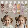 Set de Gomas Elásticas de Colores para el Cabello de Niñas con Moños y Flores para Coletas
