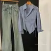 Diseño talla grande cintura irregular camisa a rayas ajustada para mujer 2024 nueva elegante con solapa manga larga