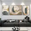 Pintura decorativa moderna de lujo ligero en tonos verde oscuro, beige y dorado con diseños abstractos geométricos de plantas, película de cristal y marco de aleación de aluminio, arte de pared hecho a medida