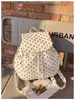 Mochila de Lona de Nylon con Lunares de Gran Capacidad para Mujer 2026 Nuevo Estilo de Moda de Gama Alta Mochila Versátil para el Viaje Diario