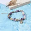 Europa y Estados Unidos transfronterizos súper ventas pulsera de viento marino concha de color collar hecho a mano pulsera pulsera de grava natural al por mayor