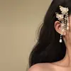 2026 Nuevo Modelo Estilo Ultra-Hada Blanco Floral Perla Larga Borla Pinza para el Cabello con Artesanía de Alta Gama y Diseño Exquisito Pinza de Pato
