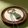 Feito à mão, com cores em degradê, borla de nó de diamante, anel de fio de algodão, chaveiro, pingente de bolsa e broche