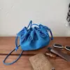 Bolso Cubo Retro de Nicho para Mujer 2026 Otoño Nuevo Estilo de Gama Alta Súper Popular Gamuza Estampado de Leopardo Hombro Único Cruzado