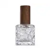 Venta al por mayor de fábrica 10 ml Decantador de perfume Mini tapa de madera maciza Portátil para viajes Botella de perfume Atomizador de niebla fina Botella de vidrio vacía