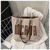 Bolso de paja de gran capacidad de moda 2023, nuevo bolso de cubo de estilo occidental simple, bolso de hombro de estilo occidental personalizado, bolso de mano