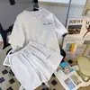 Conjunto casual de esportes para corrida feminina, estilo coreano de verão, modelagem solta, valoriza a silhueta, estiloso, de manga curta, com shorts, conjunto de duas peças para estudantes, moderno