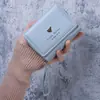 2026 Novo Modelo Mini Porta-Moedas Feminino Porta-Cartões Fofo em Formato de Coração 70% de Desconto Zíper Carteira Pequena Bolsa de Mão Clutch de Grande Capacidade
