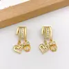 Colgante Chapado en Cobre Oro de 18K Corazón Cruzado Popular Transfronterizo Accesorios de Joyería DIY de Nicho Accesible Lujo Simple Accesorios que No se Desvanecen para Mujeres