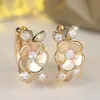 Pendientes de Flor 3D Brillantes Transfronterizos Rongxing, Exquisitas Flores Pequeñas Adornadas con Múltiples Diamantes Brillantes, Pendientes Transfronterizos para Mujer