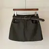 Falda corta retro versátil de línea A, nueva moda de cintura alta adelgazante que cubre la cadera anti-exposición, falda corta vaquera para mujer