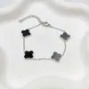 Acero de Titanio de 12 mm Flor Real de Concha Tallada Finamente No se Desvanece, Pulsera Popular de Acero Inoxidable de Trébol de Cuatro Hojas para Mujer, Fresca