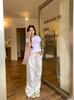 Pantalones Casuales Florales Blancos Estampados con Sentido de Diseño Holgado para Mujer, Primavera Nuevo Estilo, Pantalones Rectos de Pierna Ancha Modernos para Caminar