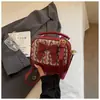Bolso bandolera versátil estilo francés para mujer, nuevo modelo 2026, diseño de nicho, bolso de hombro con lazo tejido, bolso pequeño casual elegante