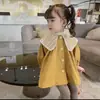 Jaqueta Feminina de Primavera e Outono 2026 Nova Moda Estilo Coreano Top Trench Coat de Comprimento Médio Estilo Britânico Para Menina Comércio Exterior