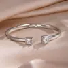 RAKOL Moda Luxo Leve Cobre Incrustado Zircônia Trevo de Quatro Folhas Aberto Ajustável Pulseira Feminina Nicho Toque de Alto Padrão Joia de Mão