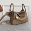 Capa Superior Piel de Vaca Togo Lindy Bolso de Piel Genuina para Mujer 2025 Nuevo Retro Europeo y Americano Bolso Cubo Moda Mano Bolso de Piel Genuina para Mujer