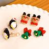 Nuevos clips para orejas de Navidad para niños, lindo diseño de reno y alce, aretes versátiles para niñas sin perforaciones, aretes de dibujos animados.