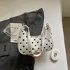 Bolso de lunares de nicho muy elegante para mujer, nuevo bolso cruzado de moda para el verano 2026, bolso de mano casual exquisito y moderno