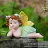 Esculturas de Resina Coloridas Transfronterizas Europeas y Americanas de Angelitos y Hadas de Flores en Posiciones Acostadas con Piernas Cruzadas, Regalos Más Vendidos en Cajas de Regalo Sorpresa