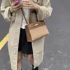 Novas bolsas femininas 2026, bolsas de platina da moda de alta qualidade, bolsas Kelly para ombro e transversal transfronteiriças