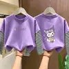 Camiseta de Manga Longa para Meninas Estilo Primavera/Outono 2026 Nova Camada de Base Estilosa para Crianças Top de Algodão Puro Top Falso Duas Peças