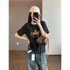 2026 Primavera Temprana Nuevo Estilo Bloques de Color Bordado de Flor de Pony 3D Corte Holgado Suéter Hombros Caídos Camiseta de Manga Corta Cepillada para Mujer
