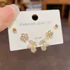 Moda Coreana y Japonesa Dulce Versátil Estilo Fresco Flor de Diamante Completa Cerezo Juego de Pendientes de Tres Piezas Pendientes Pequeños Sencillos Venta al por Mayor