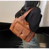Bolso transfronterizo para mujeres oficinistas, bolso de hombro versátil de alta gama de nicho para el día a día, bolso cruzado de cuero suave