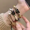 Juego de Cuatro Piezas de Pulseras Cerámicas Lindas y Dulces con Temática de Gatos, Estilo Dulce-Cool de Nicho, Diseño para Fiesta de Estudiantes, Pulseras de Pareja con un Toque de Lujo